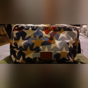 Valentino Garavani pouch.